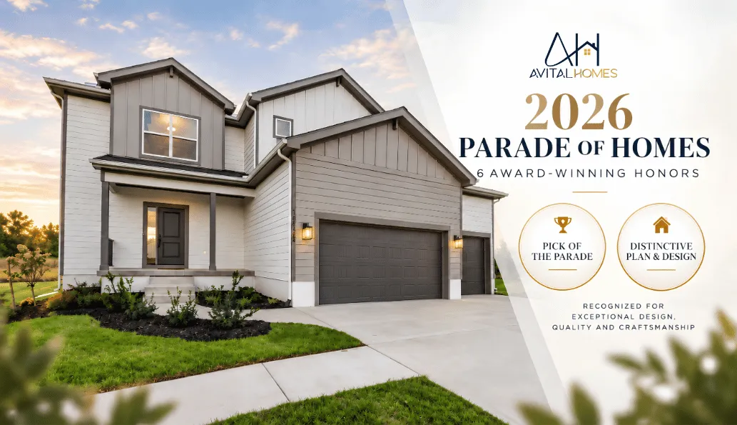 Two-story home with white and gray exterior, dark garage doors, and landscaped front yard at dusk.