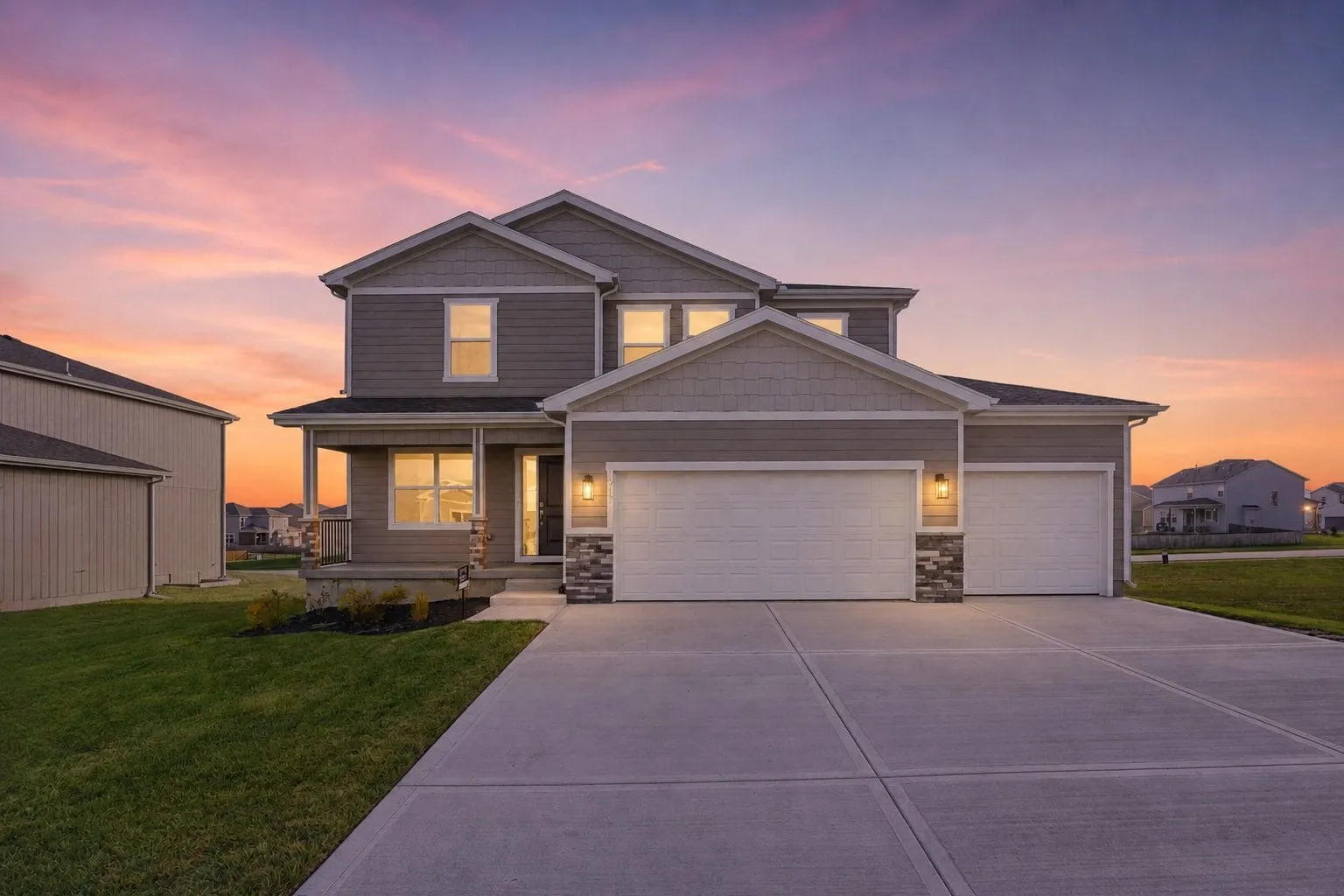 New two-story Craftsman home at twilight